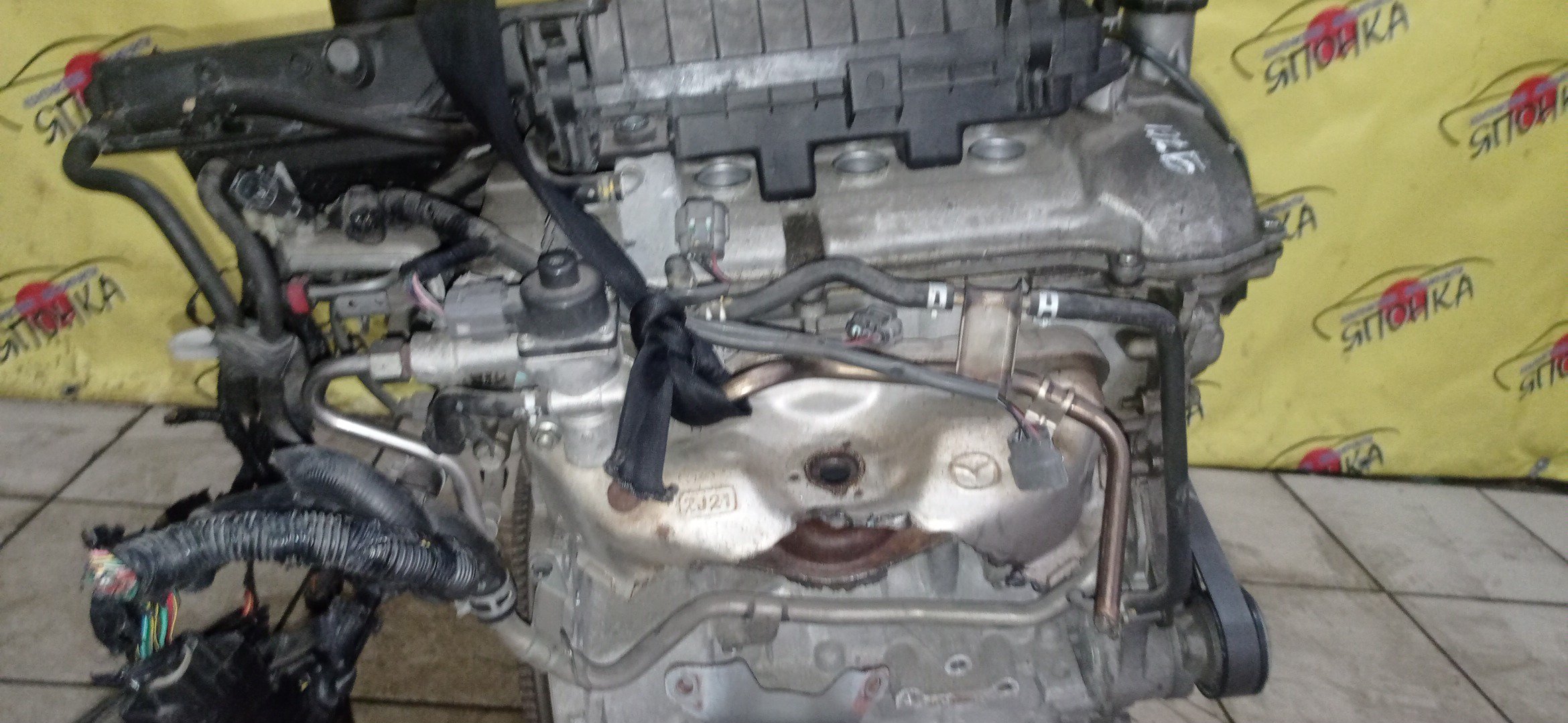 ДВС/MAZ/ZY-VE/AXELA/DEMIO/VERISA/BK5P/BL5FP/BL5FW/DC5W/DE5FS/DY5W/ЭЛЕКТРО ЗАСЛОНКА/ZJ2002300A