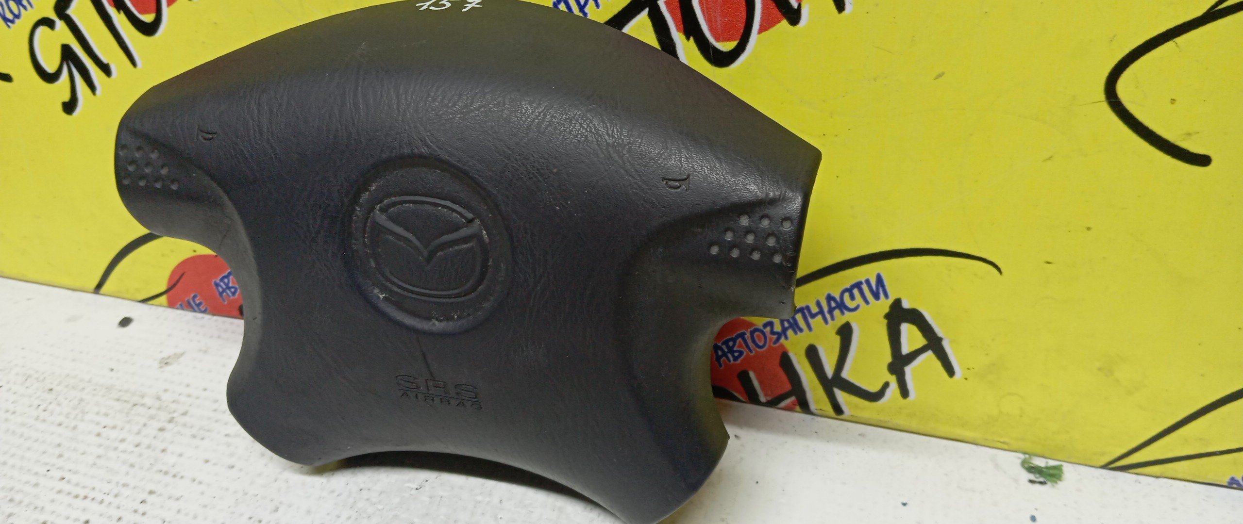 AIRBAG ВОДИТЕЛЬСКИЙ/MAZ/FAMILIA/BVHNY11/BWFY11/BWHNY11/BBVY11/BVFY11/BVENY11/BVEY11/БЕЗ ЗАРЯДА/4 ЛУЧА/1N0857K00