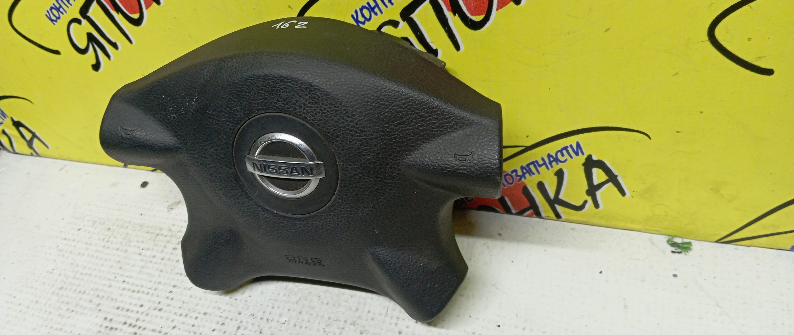 AIRBAG ВОДИТЕЛЬСКИЙ/NIS/AVENIR/PRIMERA/WINGROAD/X-TRAIL/HP12/NT30/PNT30/PNW11/PW11/QP12/RNW11/RP12/RW11/SW11/T30/TNP12/TP12/W11/WFNY11/WFY11/WHNY11/WHP12/WHY11/WPY11/WRY11/WTNP12/WTP12/4 ЛУЧА/ЗНАЧОК ХРОМ/K8510AU060