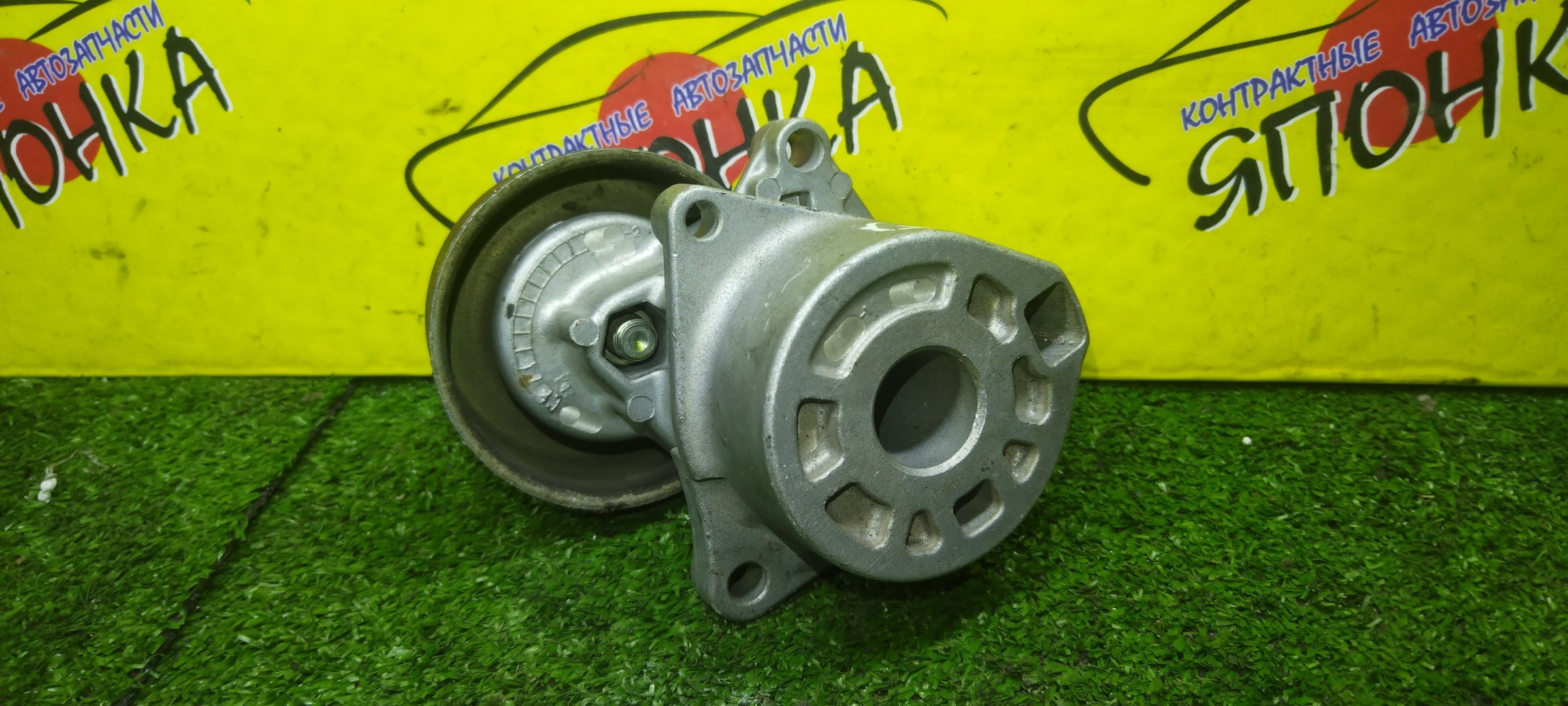 НАТЯЖИТЕЛЬ ПРИВОДНОГО РЕМНЯ/NIS/QR20-DD/QR20-DE/AVENIR/BLUEBIRD SYLPHY/LIBERTY/PRIMERA/SERENA/TEANA/WINGROAD/X-TRAIL/RNW11/RW11/TG10/RM12/RNM12/P12/TC24/TNC24/J31/WRY11/NT30/T30/С РОЛИКОМ/119556N202